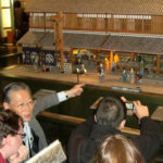 KCP students view a detailed model of the Echigoya shop in the Edo period