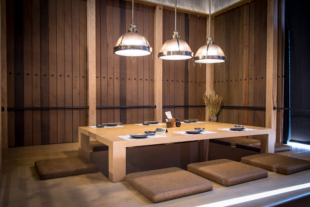 Japanese style restaurant, Wood table center and cushions and 3 lighting