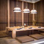 Japanese style restaurant, Wood table center and cushions and 3 lighting