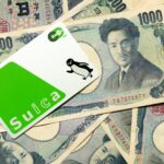 Suica card on Japanese 1000 yen banknote background