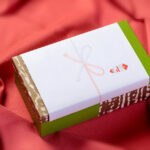 Japanese gifts are given with Japanese paper attached and the item and name written on it.