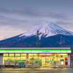 FUJIKAWAGUCHIKO, YAMANASHI, JAPAN - APRIL 12, 2017: FamilyMart convenience store under Mt. Fuji. FamilyMart is the second largest convenience store company in Japan.