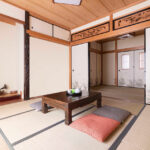 Black wooden table and cushions in the Japanese-style living room